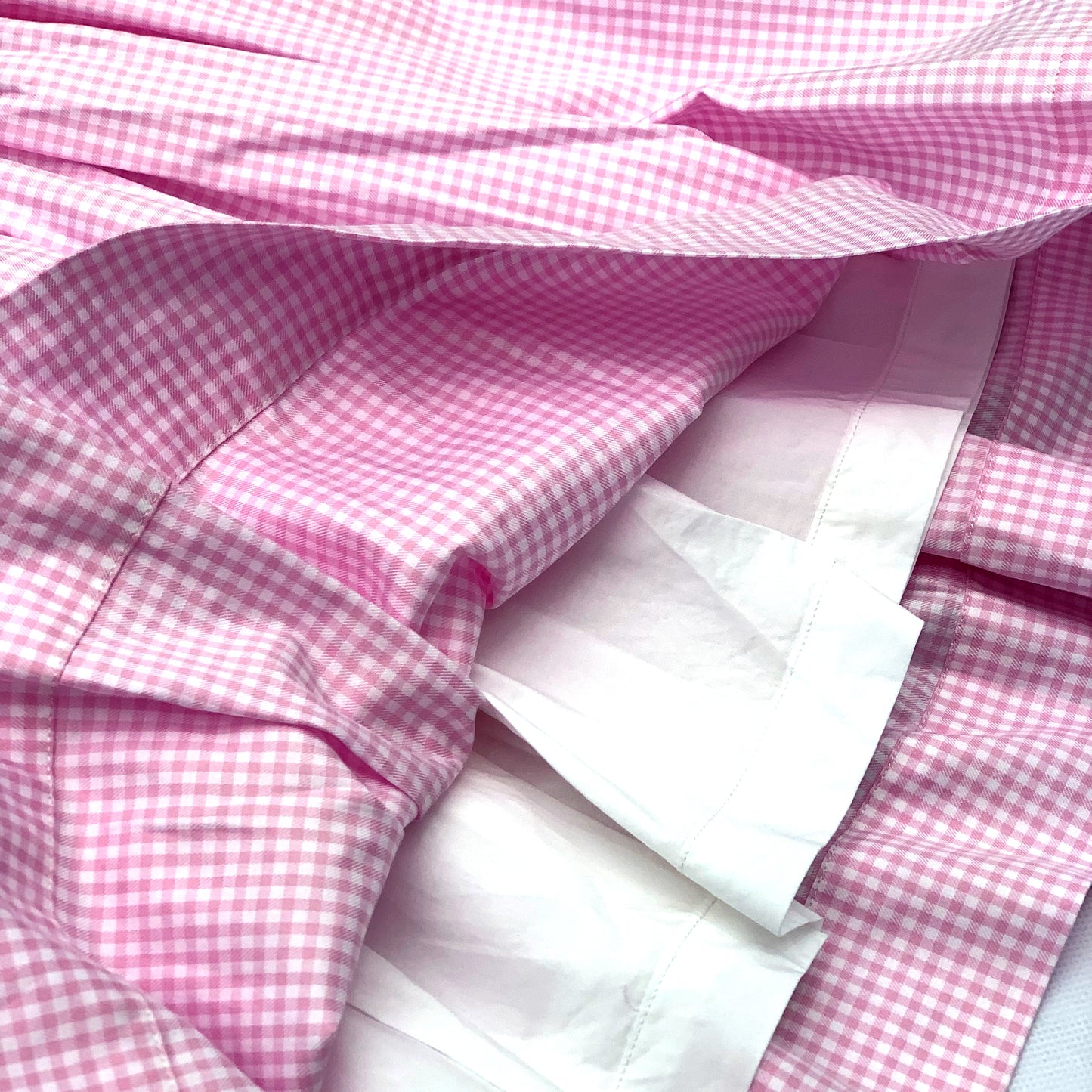 Stunning pink dress hand smocked with tricolor roses.