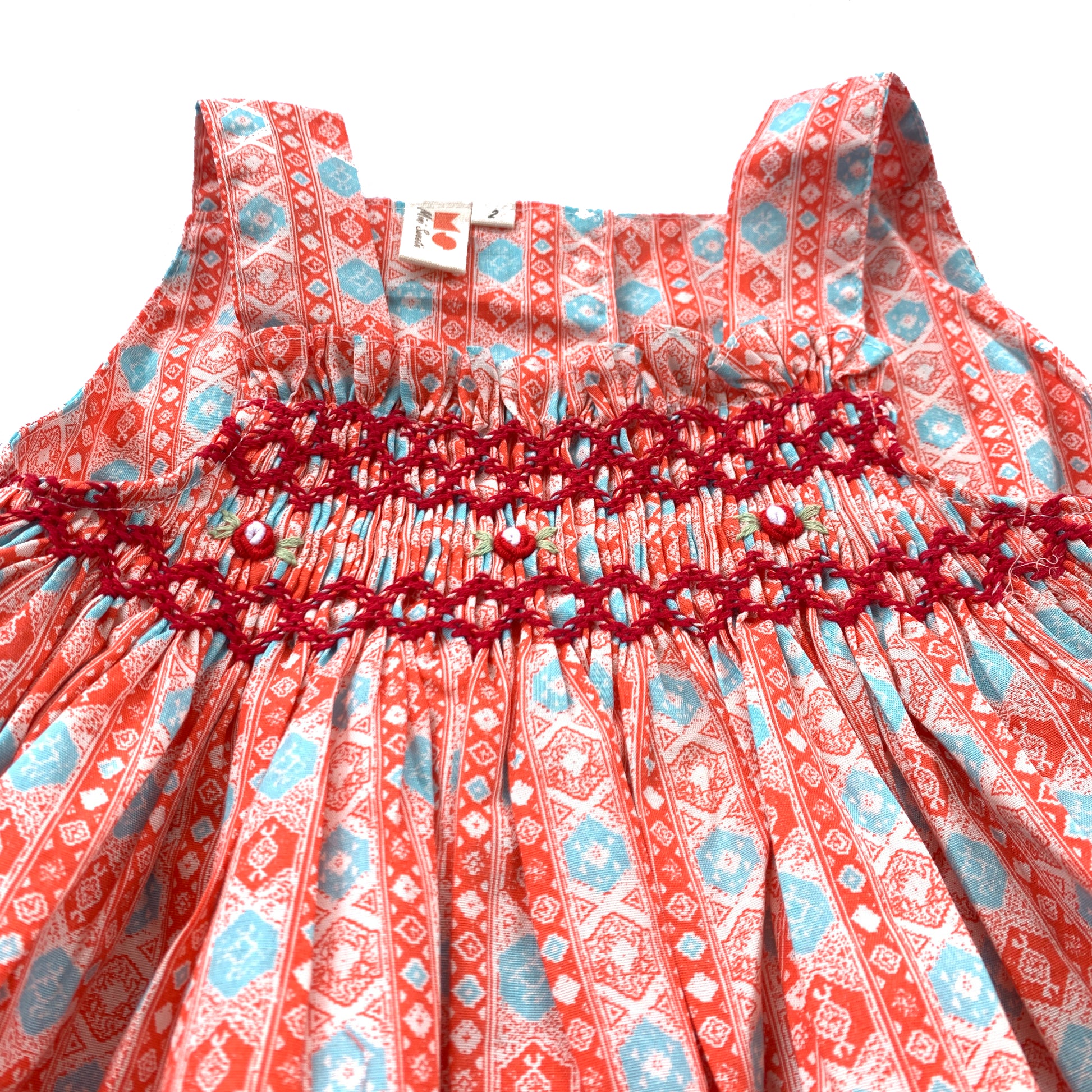 Brilliant Strap Orange Smocked Dress.
