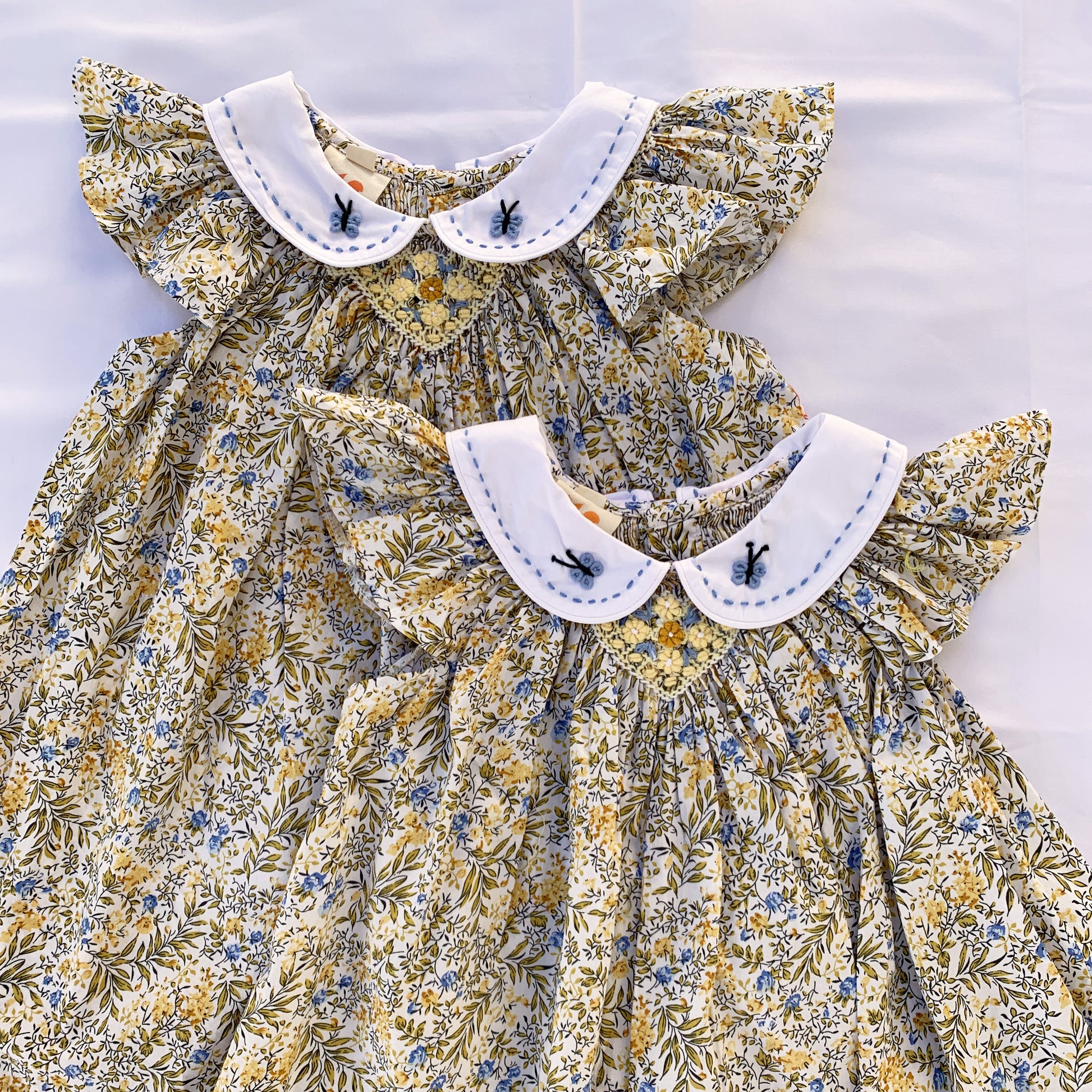 Bishop Blue Butterfly Smocked Dress