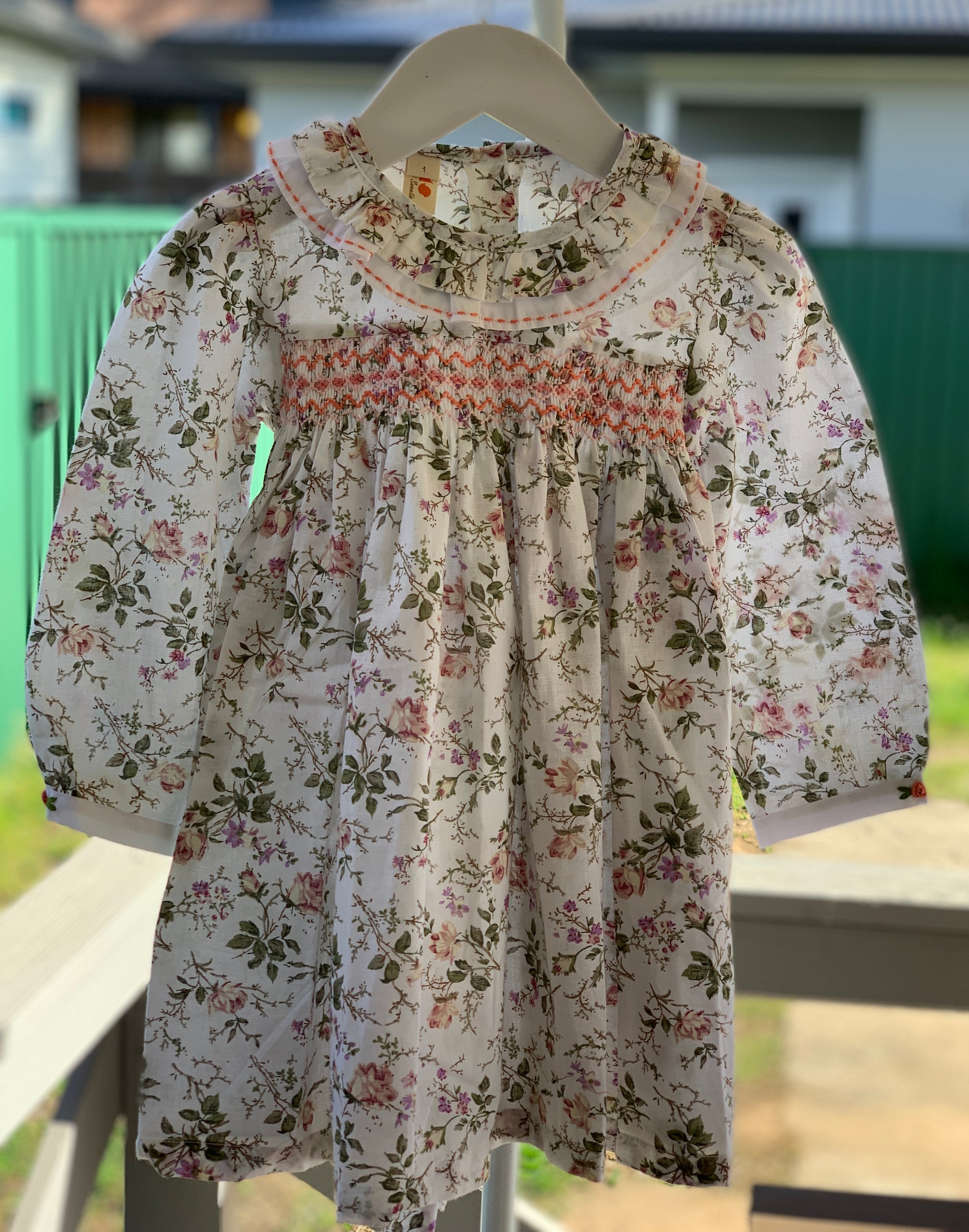 Sweet rose long sleeve dress.