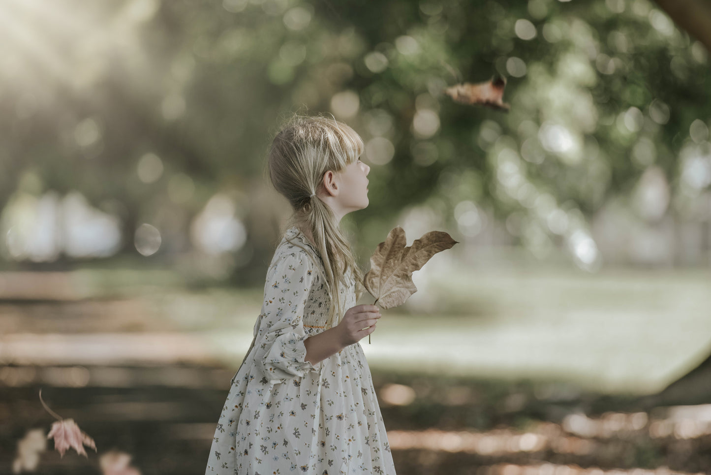 Cream long sleeves hand smocked dress.