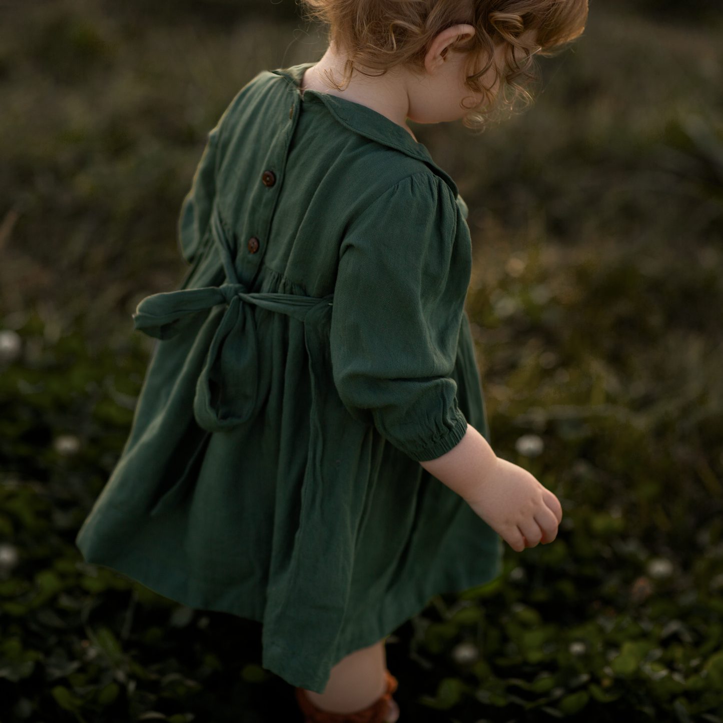 Green long sleeves hand smocked with embroidered pearls
