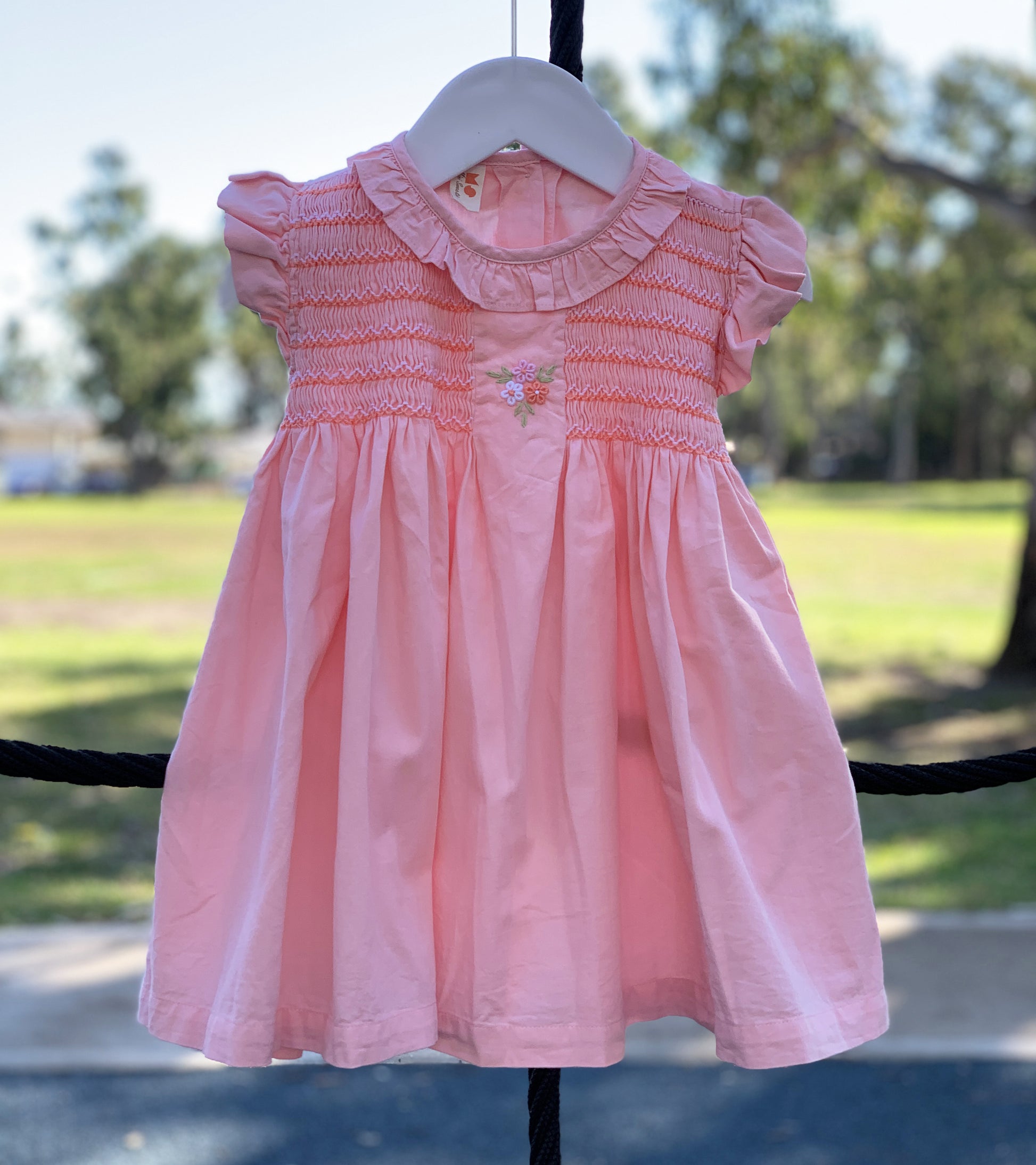 Coral Pink Smocked Dress.