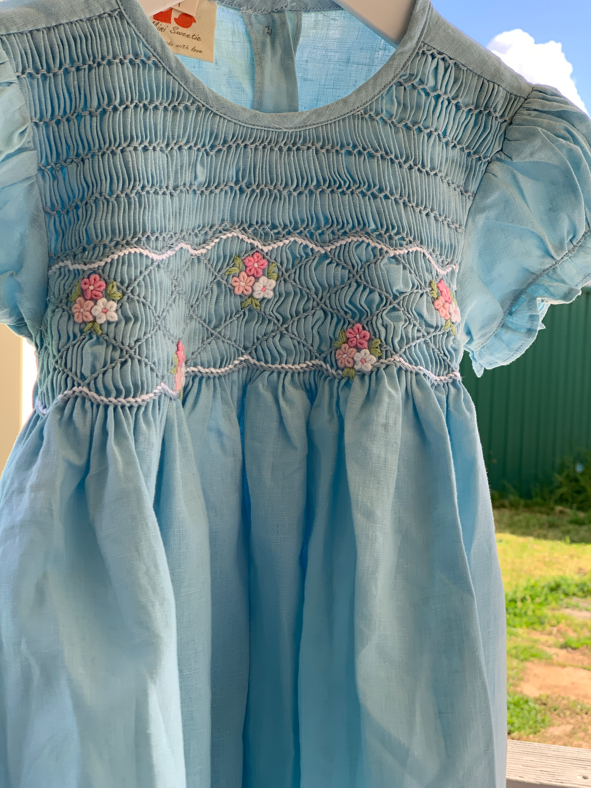 Blue sky classic smocked dress.